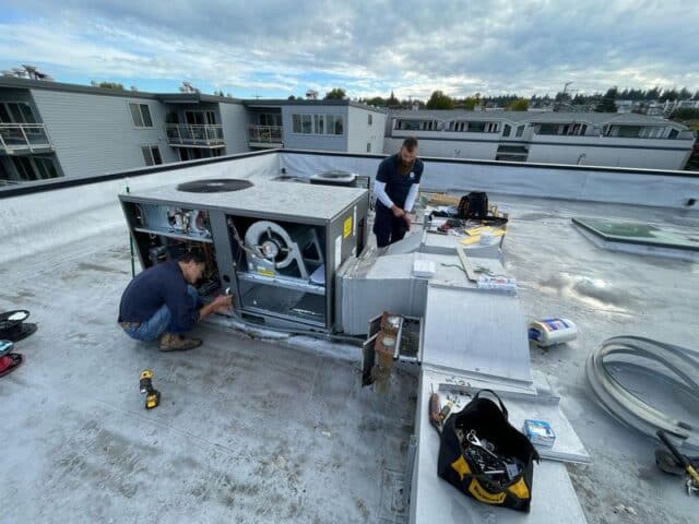 technician working on rooftop