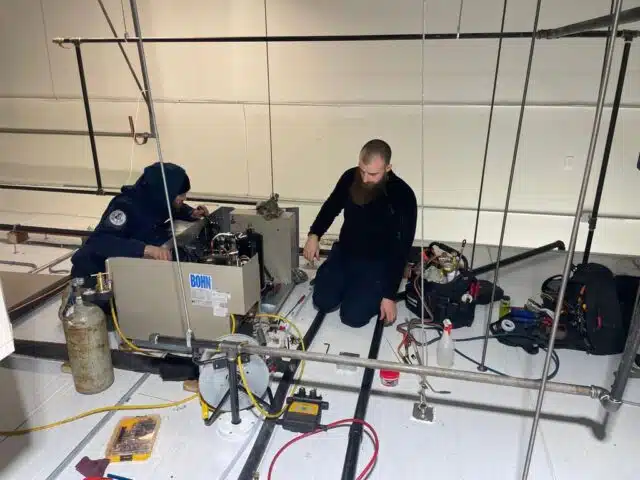 technicians inspecting image